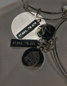 The Lodge Coordinates charm